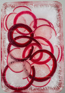 Fresh radish slices frozen in clear ice block