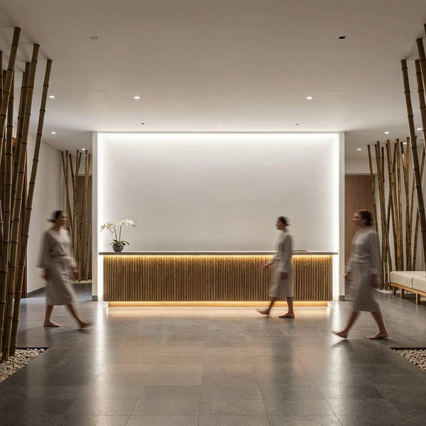 Women in robes walking past modern spa reception desk JPG Mockup Image