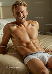 Relaxed young man smiling on bed in natural light