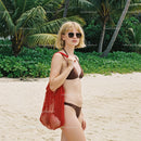 Young Woman in Bikini and Sunglasses on Tropical Beach Landscape