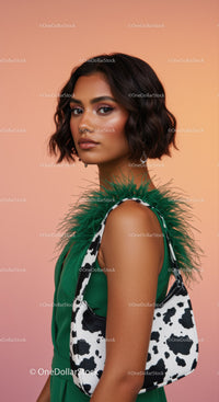 Elegant Woman in Green Dress with Cow Print Handbag Portrait