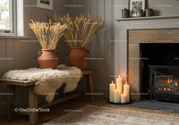 Cozy corner with dried wheat and glowing candles