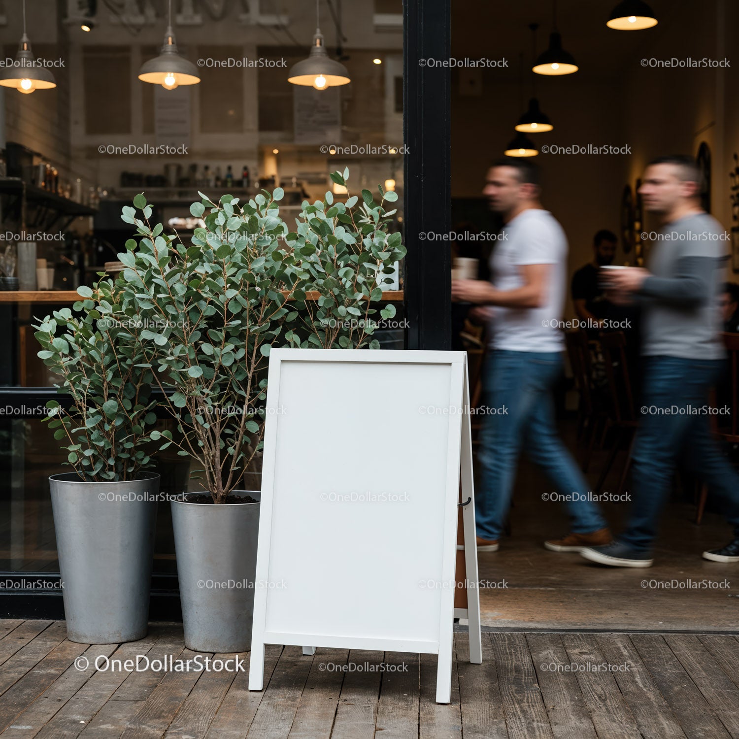 Blank white sandwich board outside modern cafe entrance