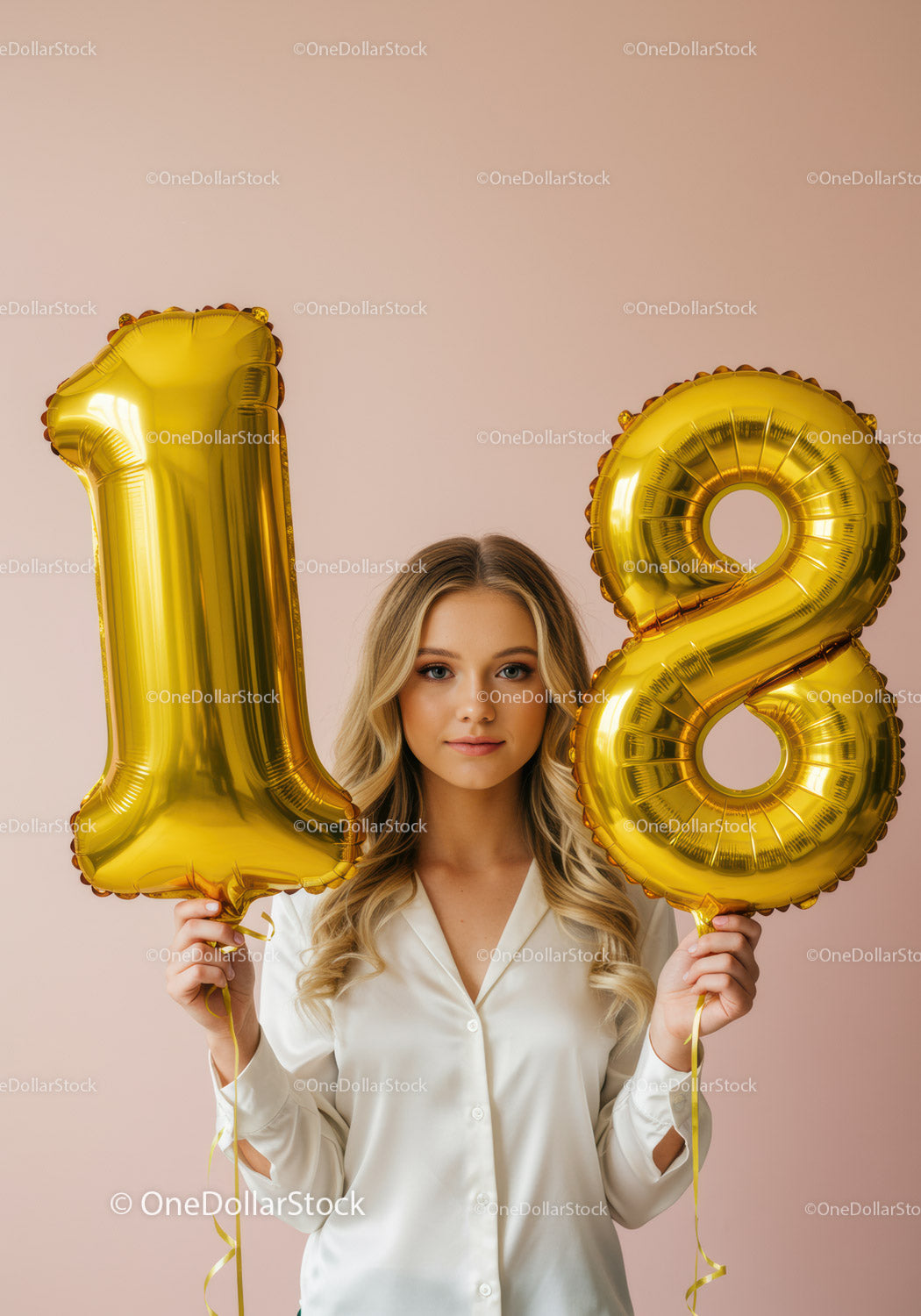 Young woman holding golden 18 balloons on pink background