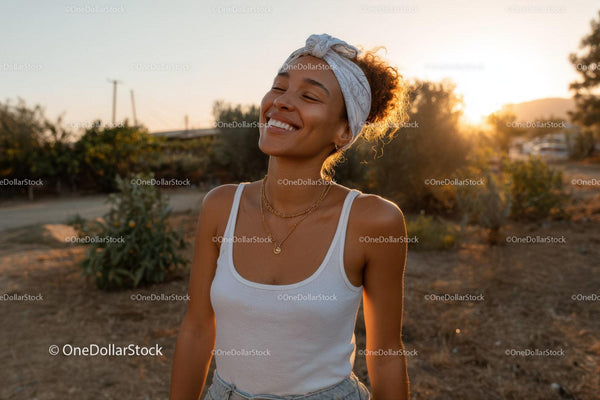 Joyful Woman Smiling Outdoors in Sunset Light