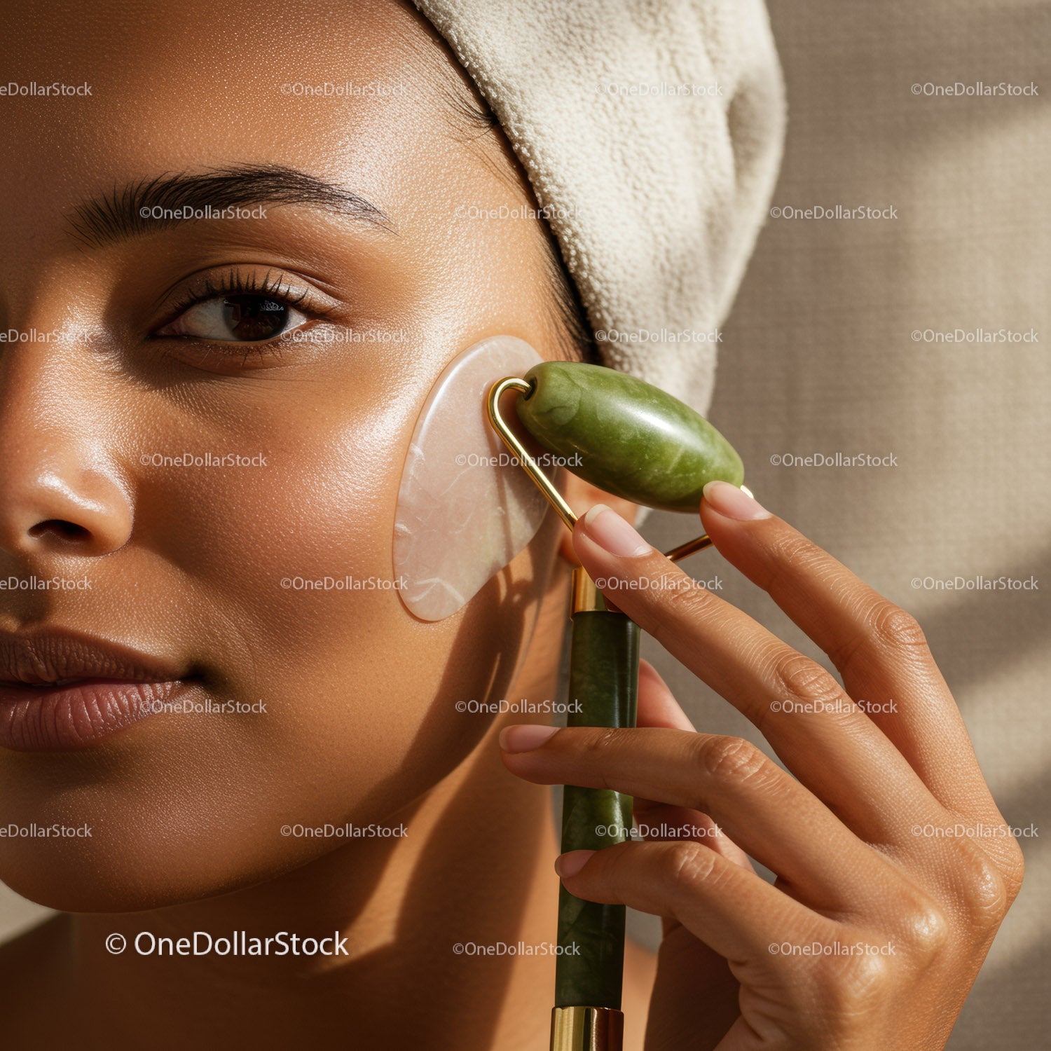 Close Up of Woman Using Jade Roller for Facial Massage