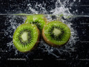 Vibrant Fresh Kiwi Slices in Water Under Bright Lighting