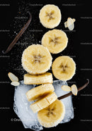 Fresh banana slices with vanilla and sugar on ice