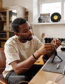 Man adjusting camera on tripod for content creation