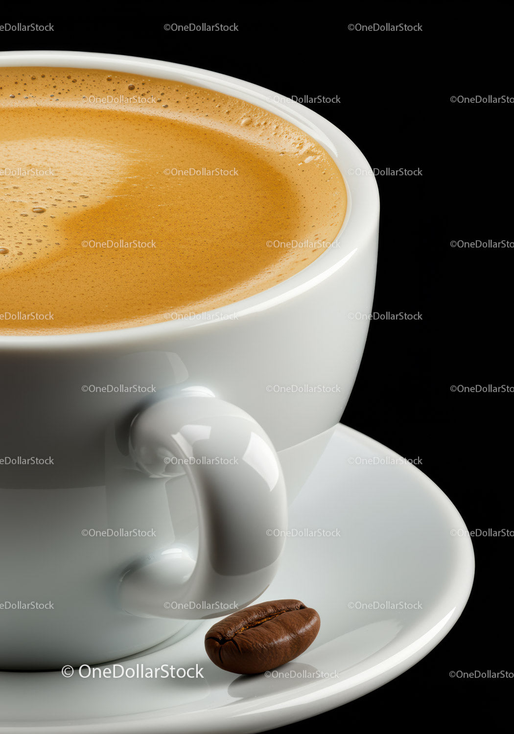 Close-up of creamy coffee in white cup with coffee bean