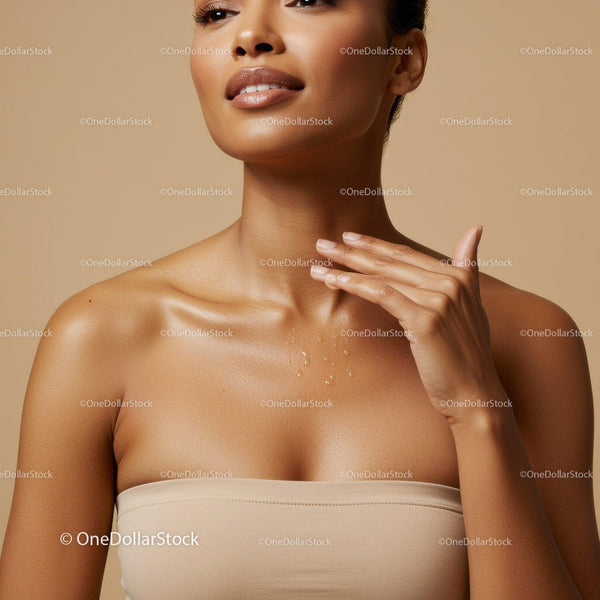 Elegant Woman Touching Neck with Glowing Skin in Studio