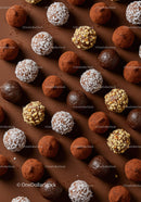 Assorted gourmet chocolate truffles in various coatings