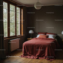 Cozy Bedroom with Rust-Colored Bedding and Large Windows