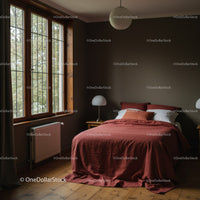 Cozy Bedroom with Rust-Colored Bedding and Large Windows