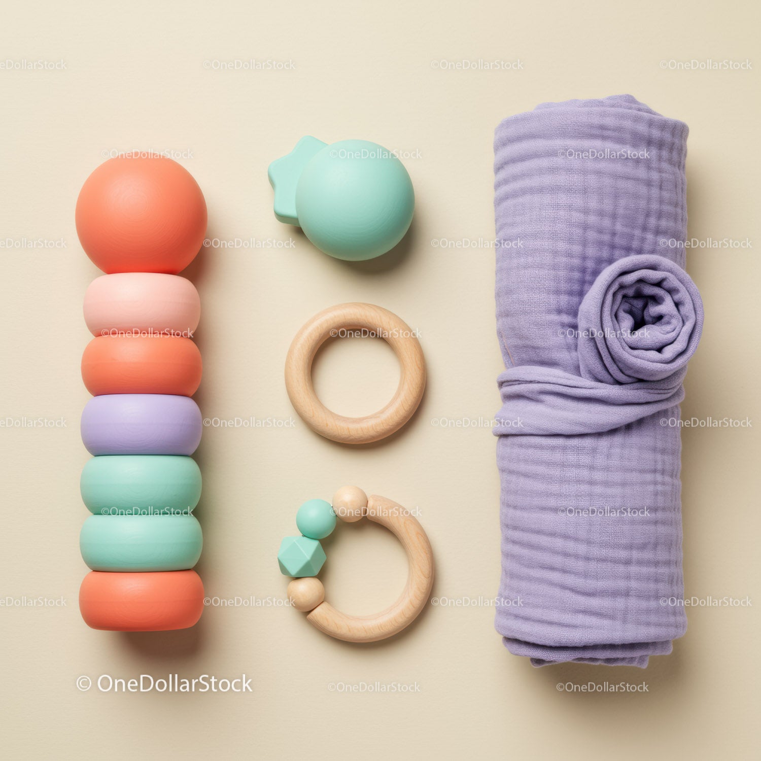 Pastel Wooden Baby Toys and Soft Lavender Swaddle Blanket
