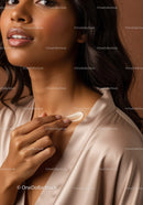 Elegant Woman with Smooth Skin and Silky Hair in Beige Blouse