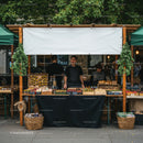 Artisan baked goods and sweets at outdoor market stall