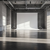 Minimalist Industrial Photo Studio with White Backdrop