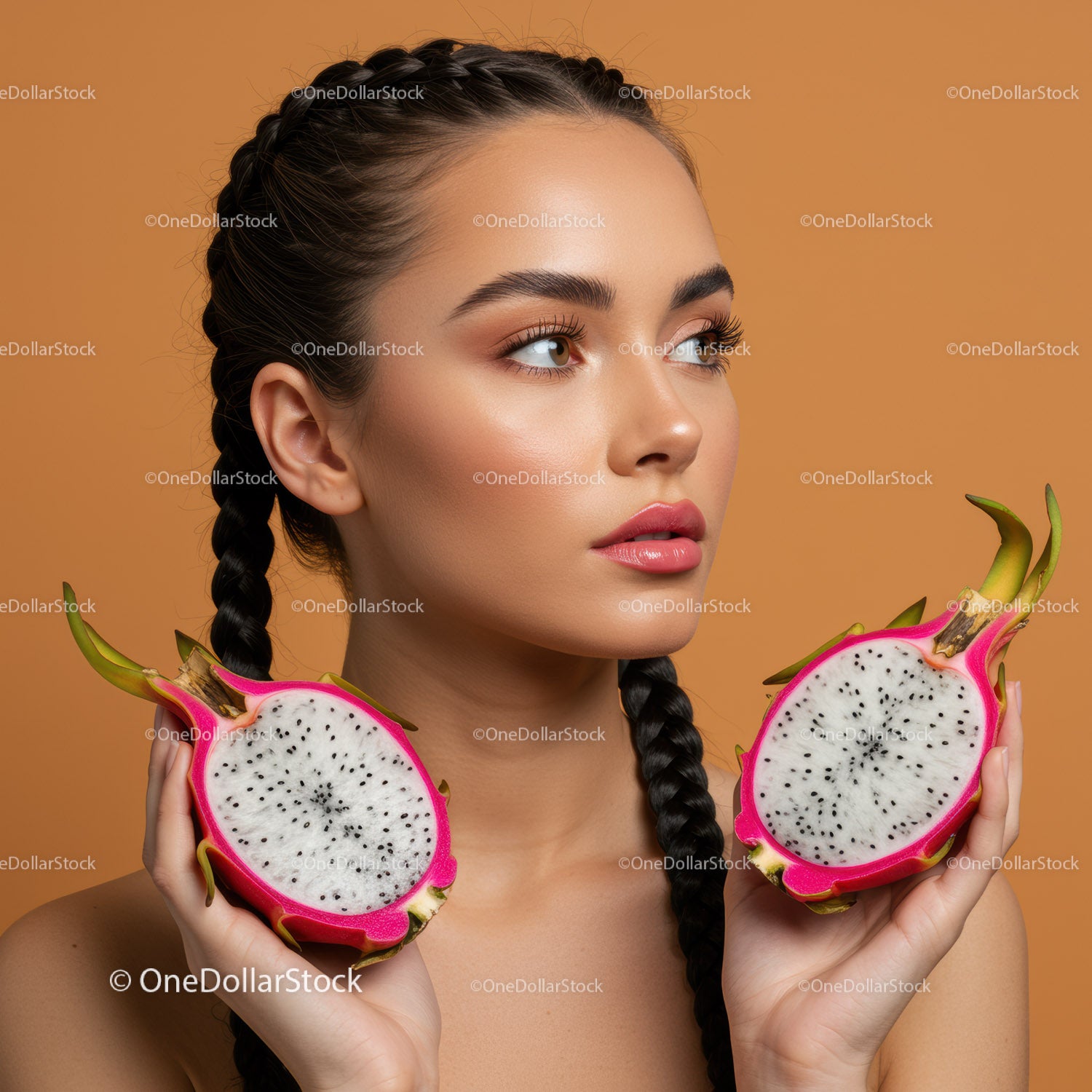 Portrait of a Woman with Braided Hair Holding Fresh Dragon Fruit
