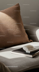 Cozy Beige Cushion on Light Gray Couch with Sunlight Shadows