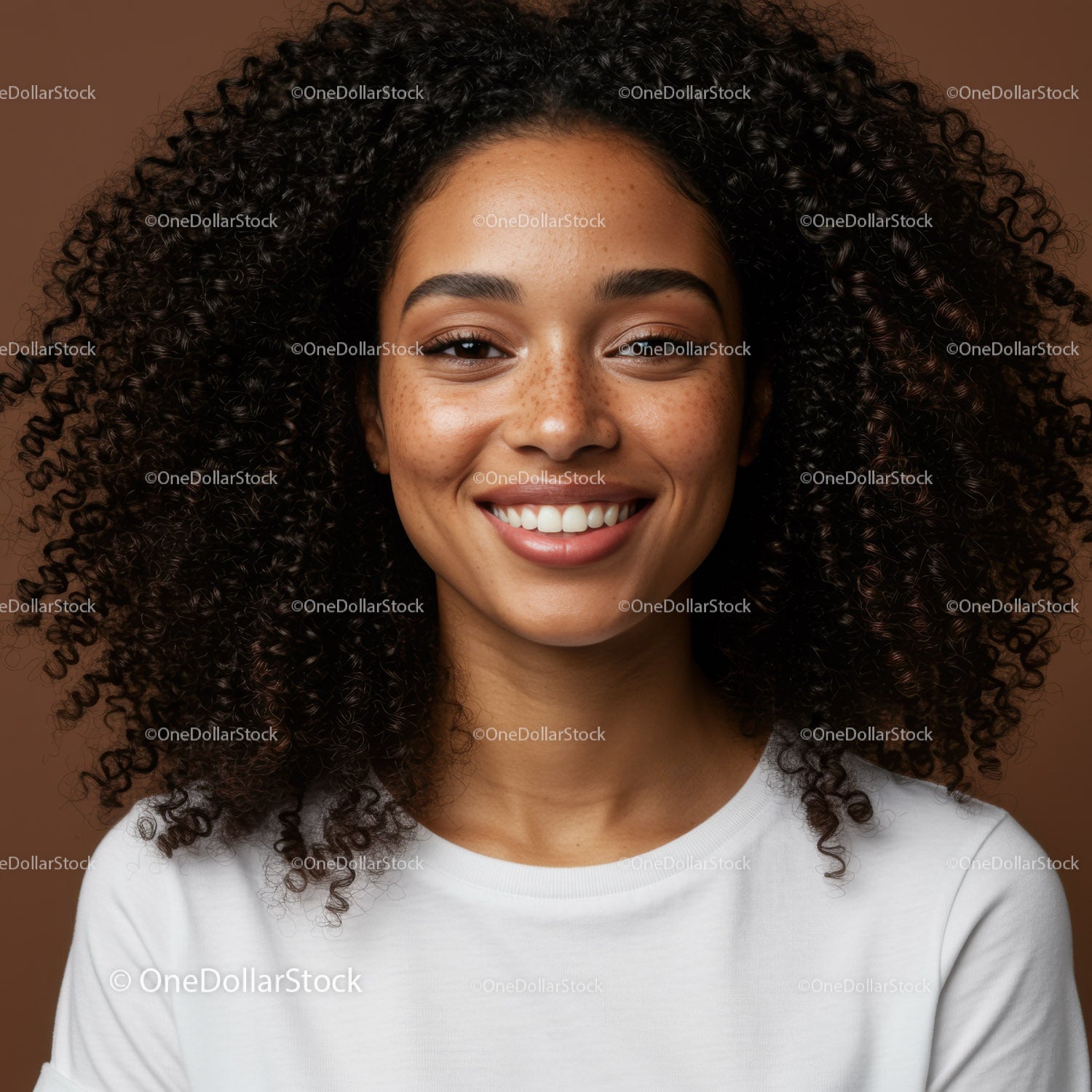 Portrait of a Happy Young Woman with Curly Hair and Bright Smile