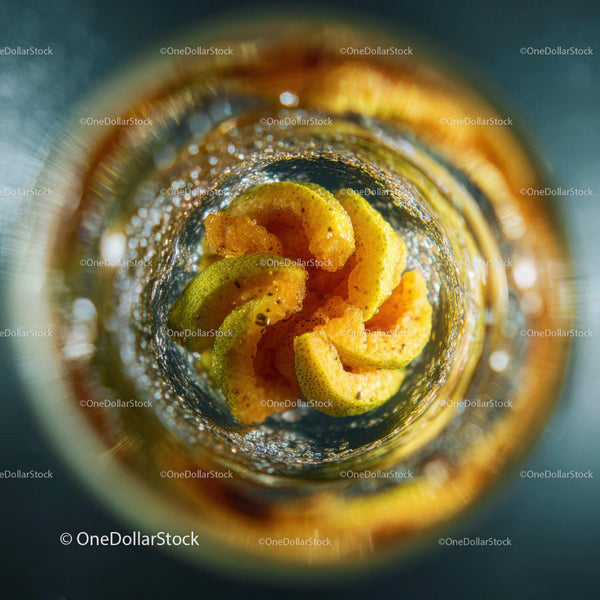 Close-up of Lime Wedges in Sparkling Water Ready to Refresh