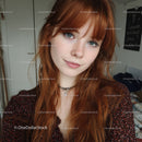 Portrait of a Red-Haired Girl with Green Eyes and Freckles in Casual Attire