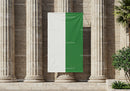 White and green vertical flag hanging on stone columns