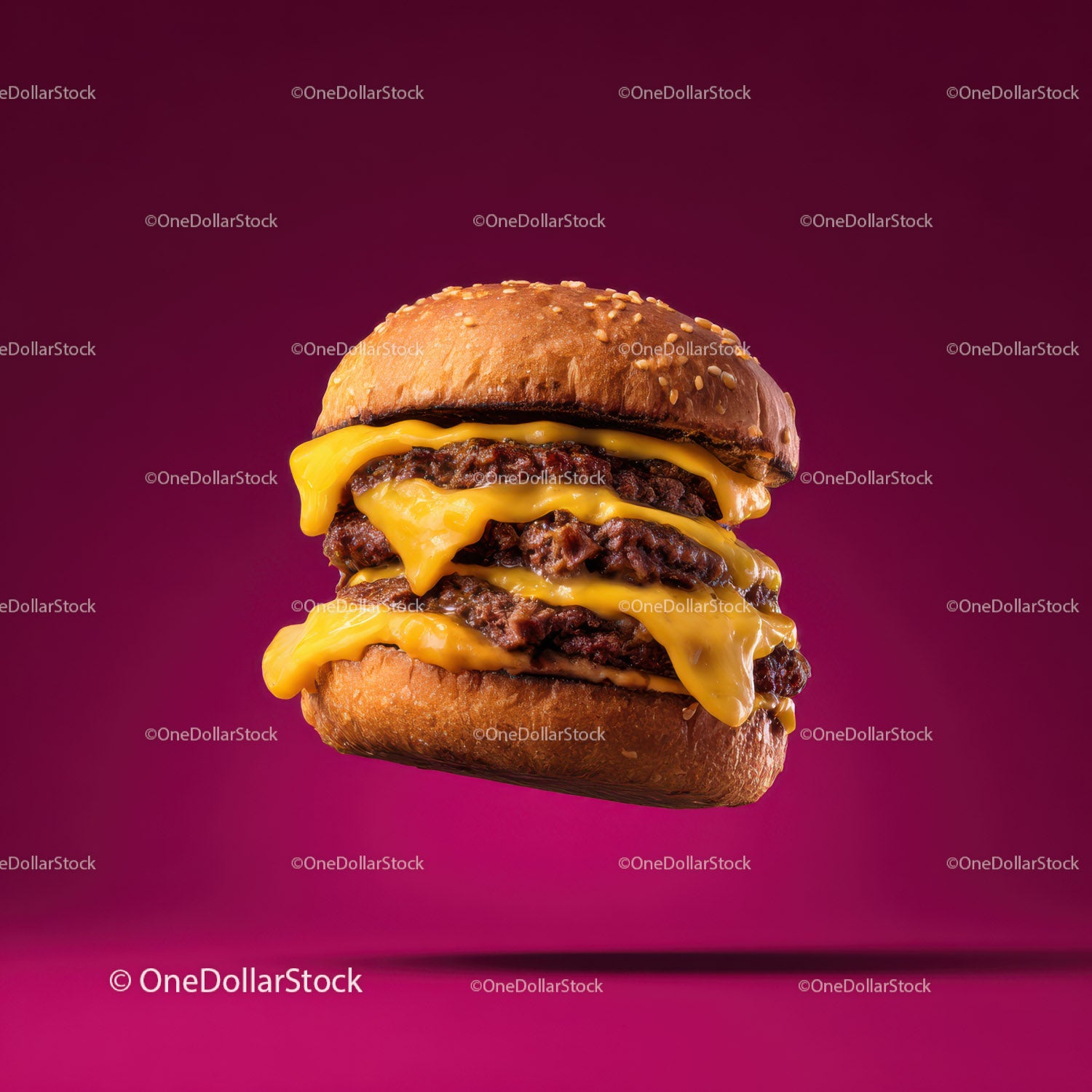 Soczysty podwójny cheeseburger z roztopionym cheddarem i bułką sezamową