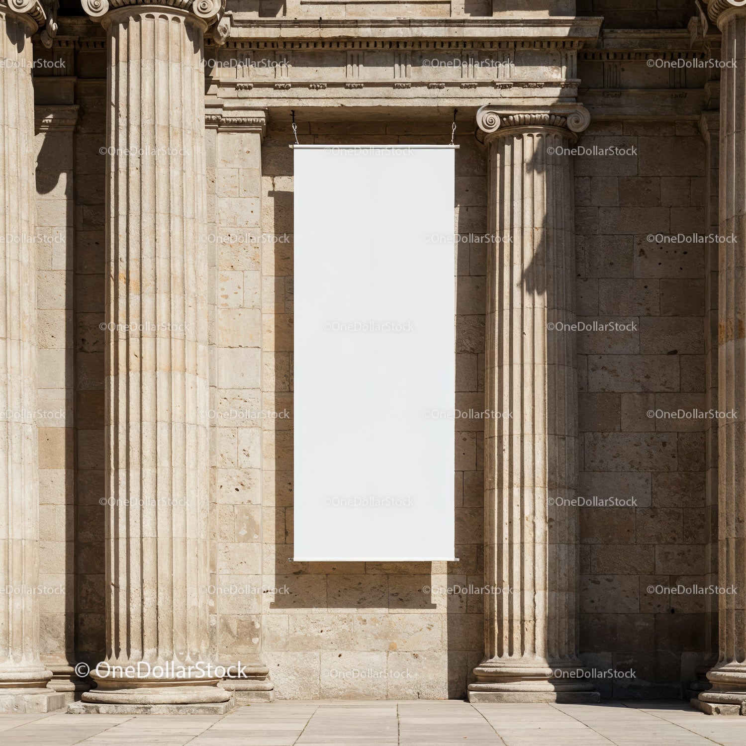 Blank white banner hanging on classical stone columns