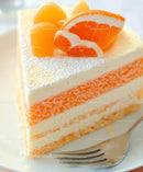 Orange Layer Cake with Fresh Orange Slices and Cream Frosting