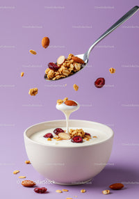 Bowl of yogurt with granola nuts and dried berries