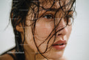 Close-up of Woman with Water Droplets on Skin and Wet Hair