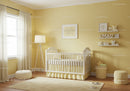 Bright Nursery Room with Yellow Walls and White Baby Crib
