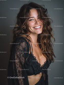 Bright Smiling Woman in Black Lace Top with Long Wavy Hair