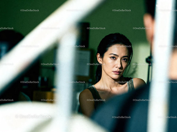 Pensive woman in thoughtful moment indoors