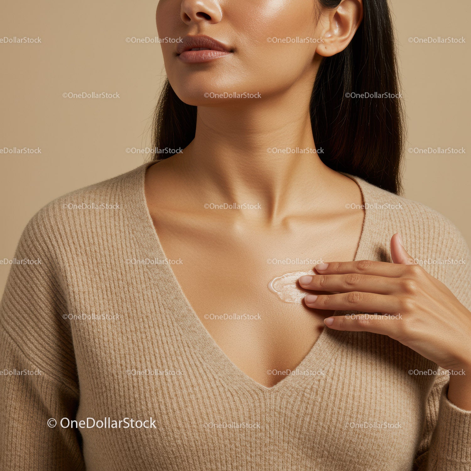 Beautiful Woman Applying Skin Cream for Healthy Radiant Skin