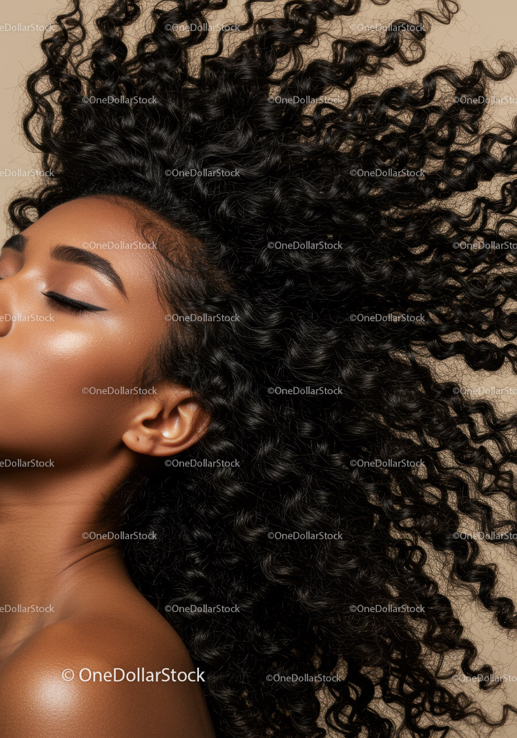 Close-up of peaceful woman with natural curly hair