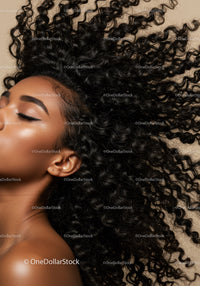 Close-up of peaceful woman with natural curly hair