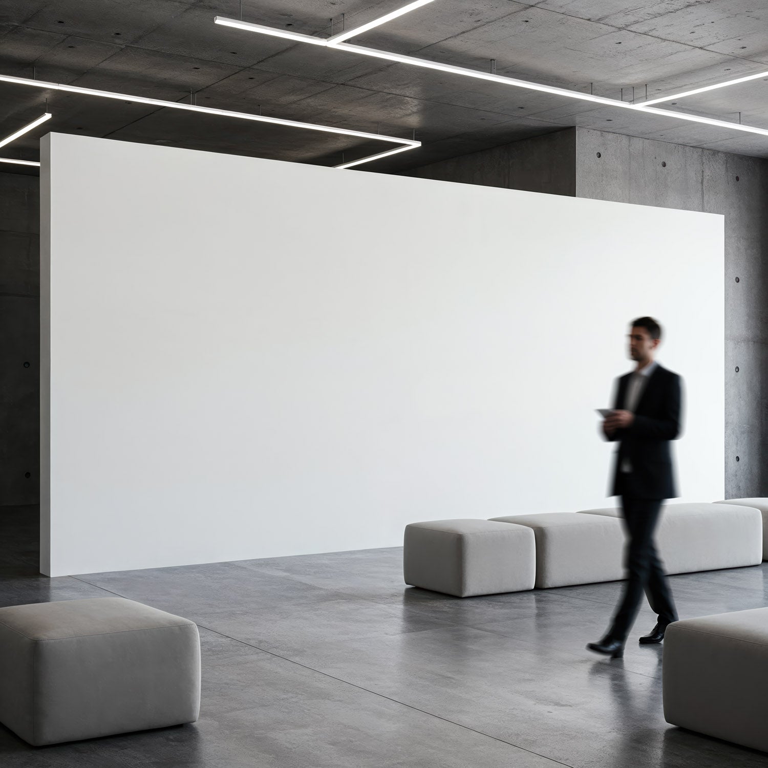 Blurred businessman walking in modern minimalist lobby