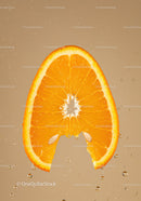 Fresh orange slice dripping with juice in water