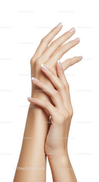 Elegant hands with classic French manicure on white background