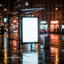 Night City Street with Illuminated Bus Stop and Neon Signs