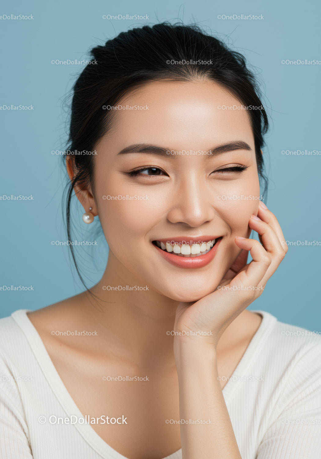 Portrait of a Smiling Asian Woman with Charming Smile and Flawless Skin