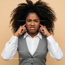 Frustrated Young Woman with Curly Hair Expressing Confusion and Stress