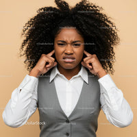 Frustrated Young Woman with Curly Hair Expressing Confusion and Stress