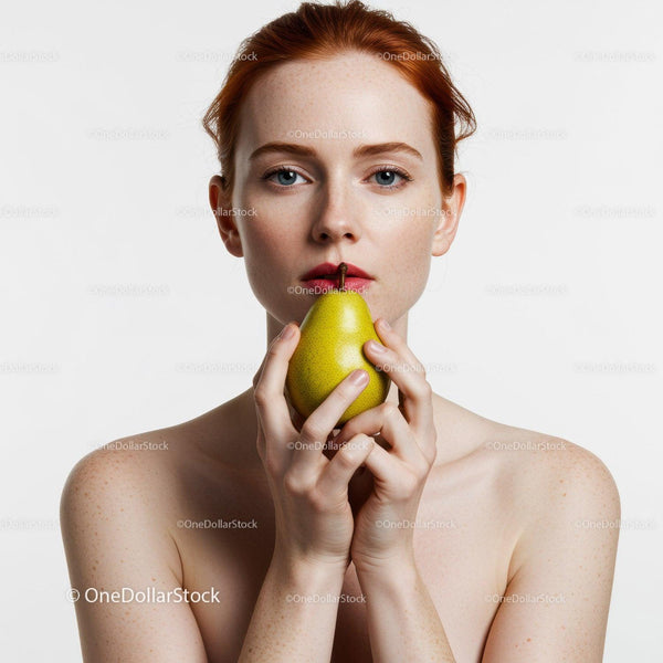 Elegant Woman with Freckles Holding a Pear in Studio Portrait