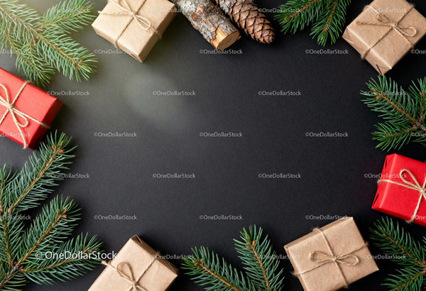 Festive holiday wrapped gifts with pine and cones