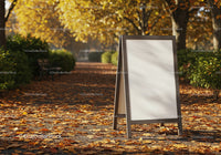 Blank A-frame Signboard on Leaf-covered Autumn Path