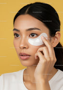 Woman Applying Under-Eye Patches for Skincare Beauty Treatment